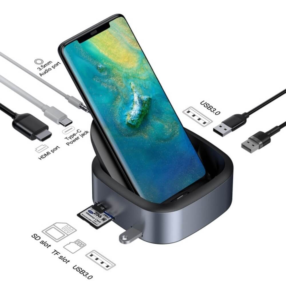 A phone in the phone docking station charging stand. The different charging cords and slots: HDMI port, Type-C power jack, 3.5mm audio port, USB3.0, SD slot, TF slot and another USB3.0.
