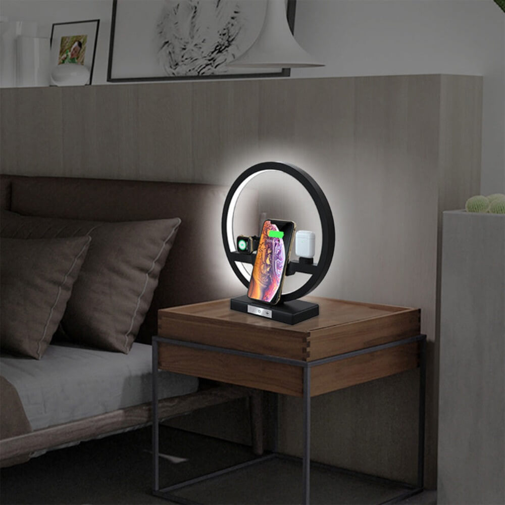 The bedside lamp with wireless charging standing on a bedside table in a bedrooms.